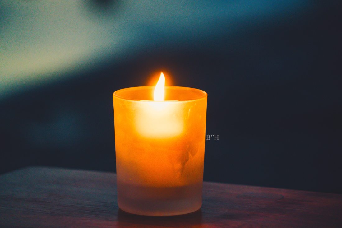 orange memorial candle flame